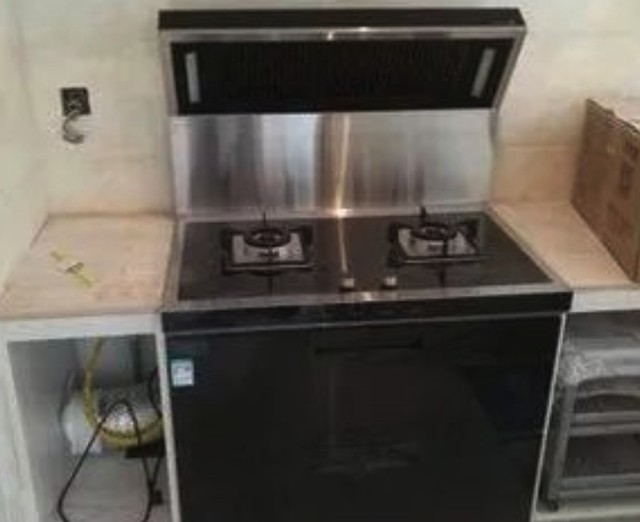 用了一段时间的集成灶 我想换回我的油烟机 